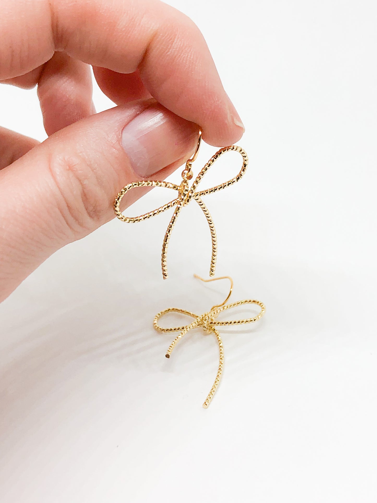 Gold bow earrings