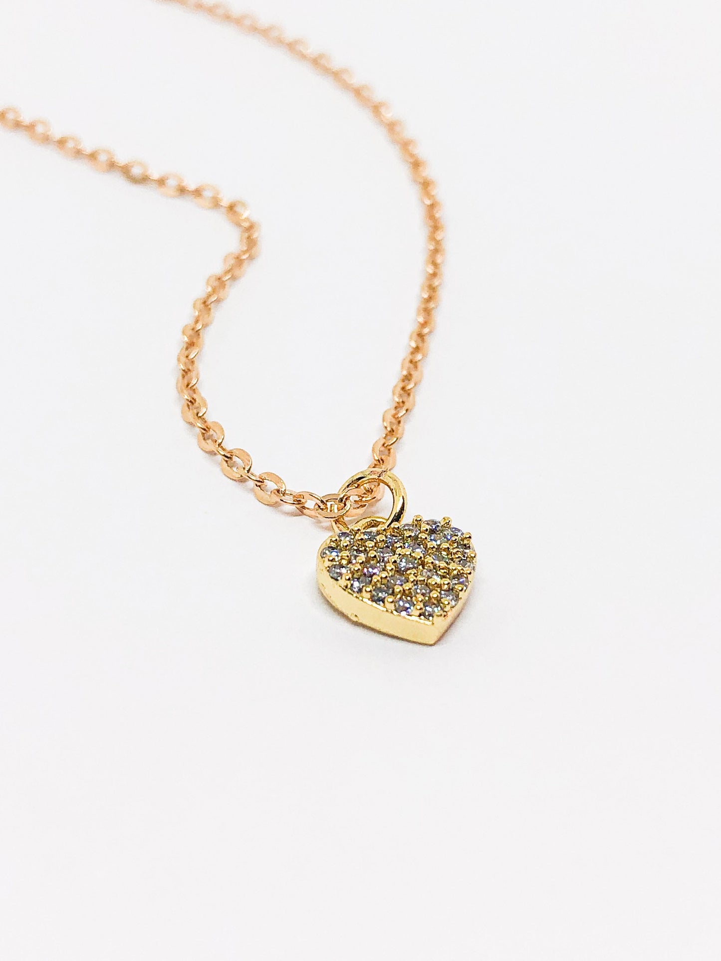 Rhinestone heart necklace in silver and gold