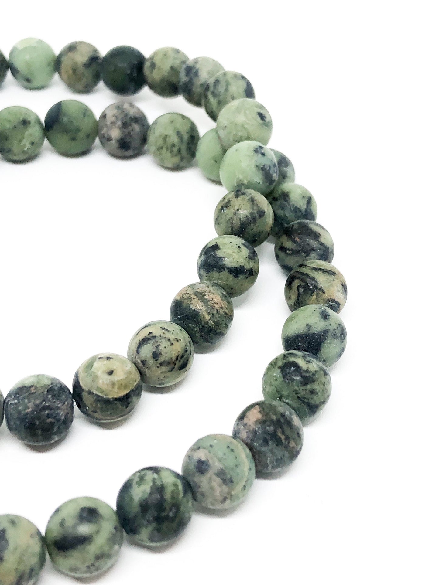 Black and green speckled jade bracelet