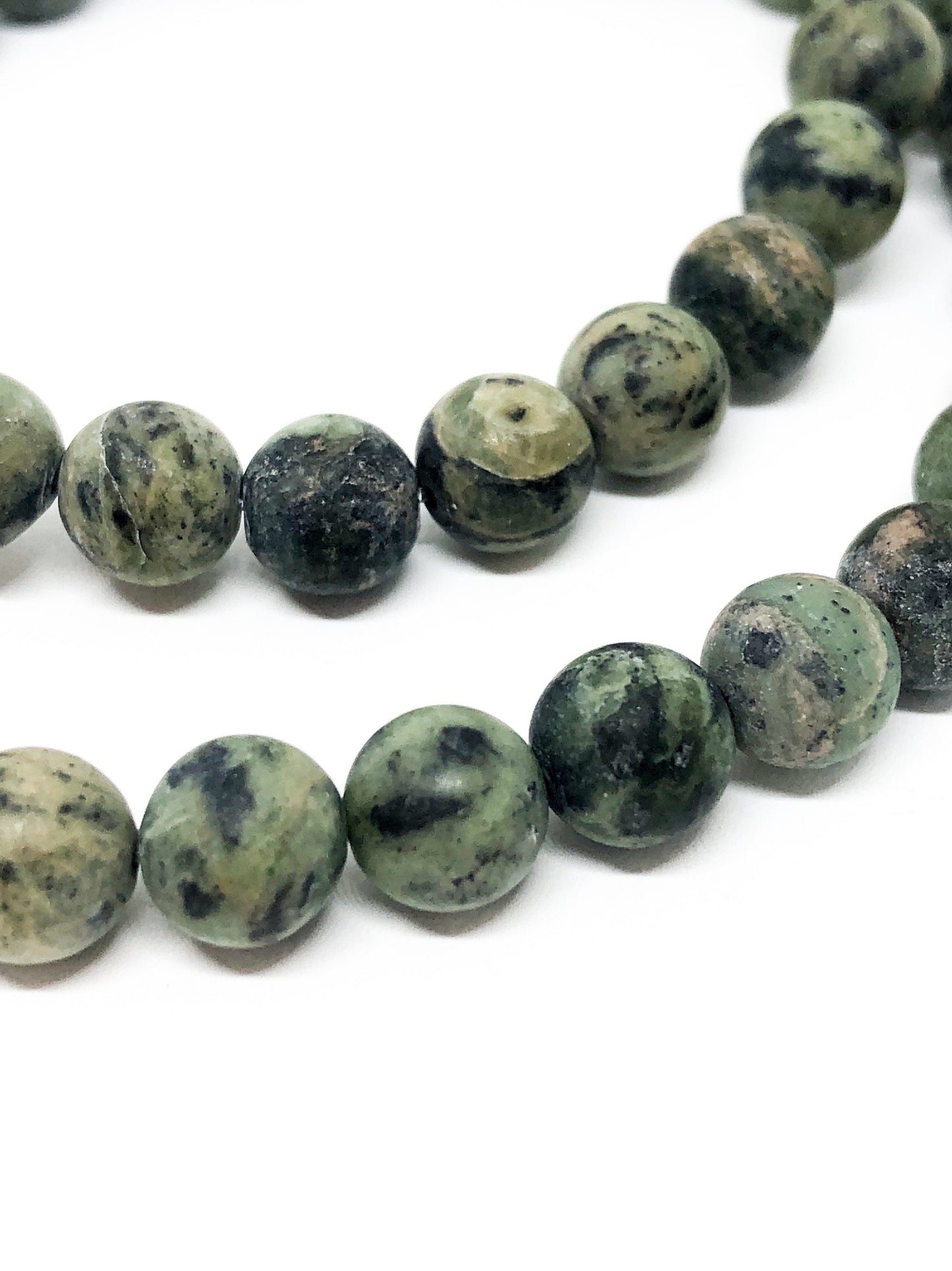 Black and green speckled jade bracelet