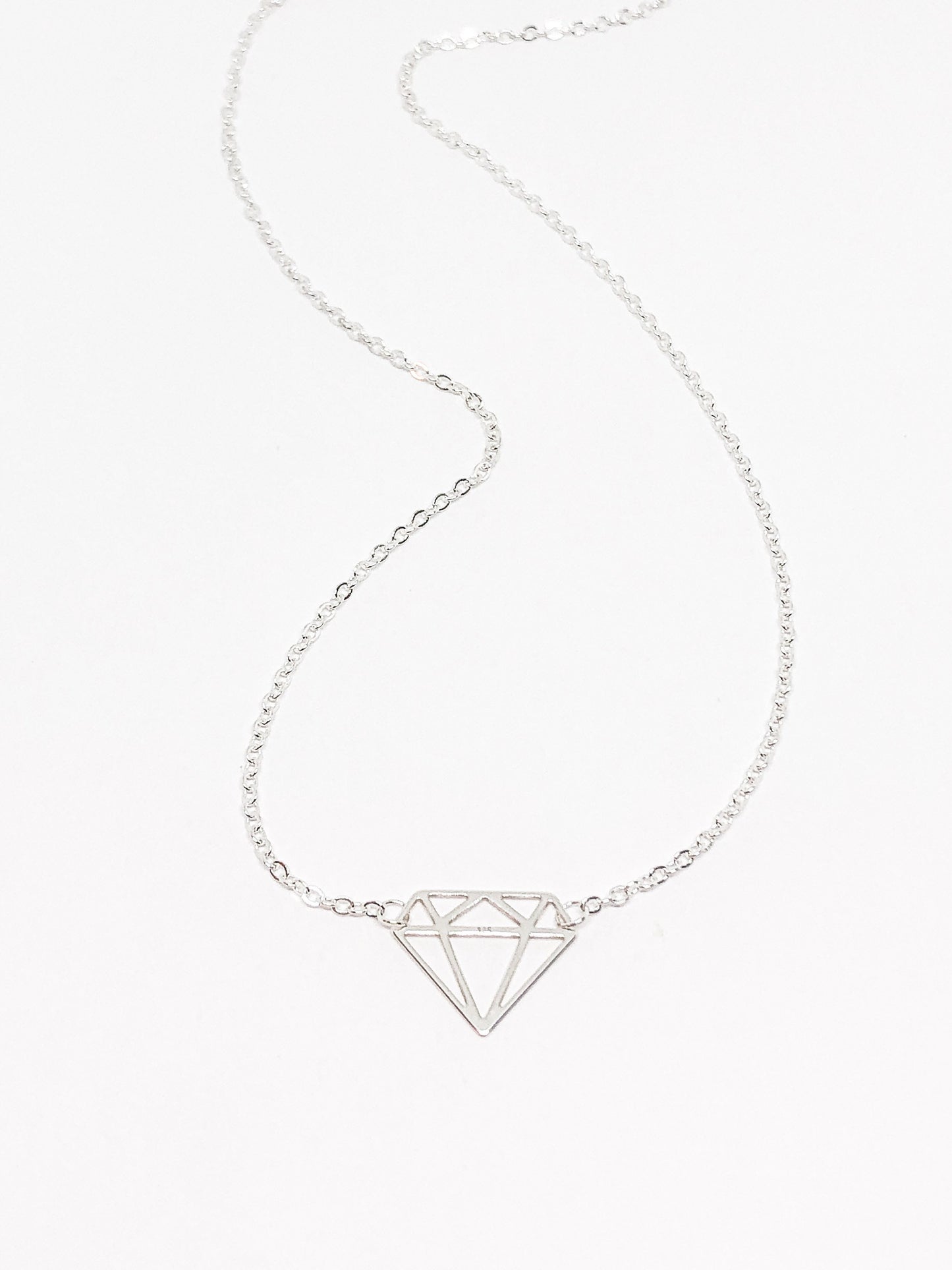 Diamond pendant in silver or gold