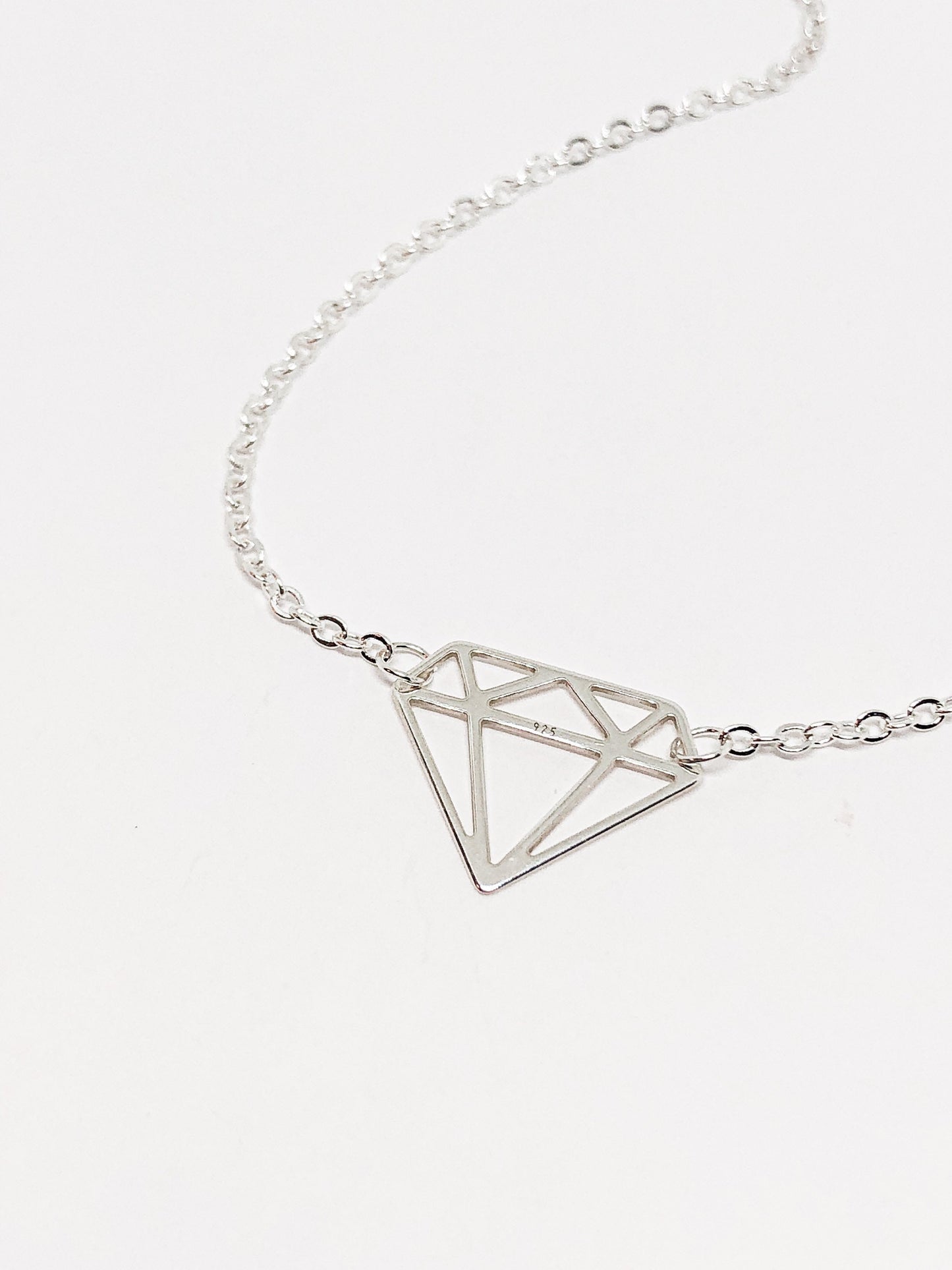 Diamond pendant in silver or gold