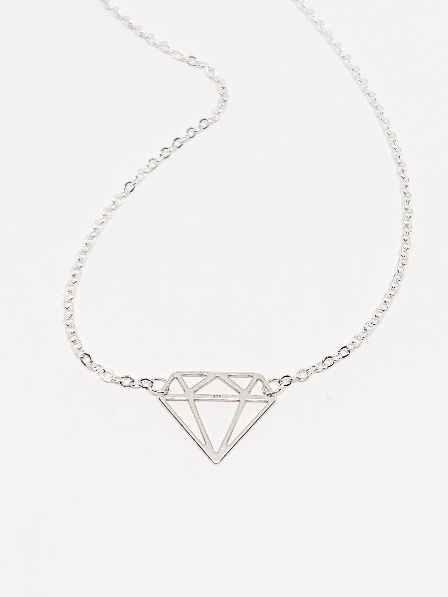 Diamond pendant in silver or gold