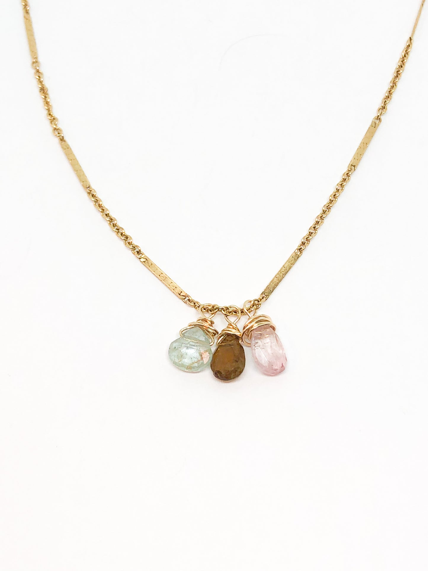 necklace in gold with aquamarine and tourmaline accents